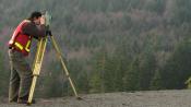 Person using surveying tools